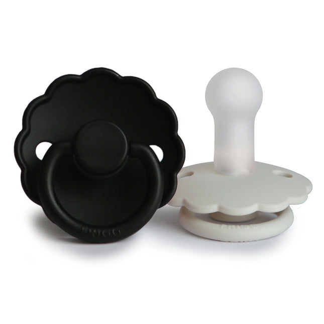 <tc>Frigg</tc> <tc>tétine</tc> Taille 1 Daisy Cream/Jet Black Silicone 2-Pack