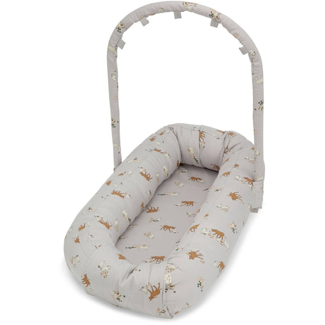 <tc>Konges Slojd</tc> Nid de bébé Farm Bleu 83x43cm