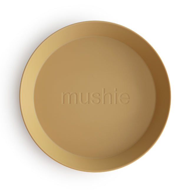 <tc>Mushie</tc> Assiette bébé ronde moutarde 2pcs