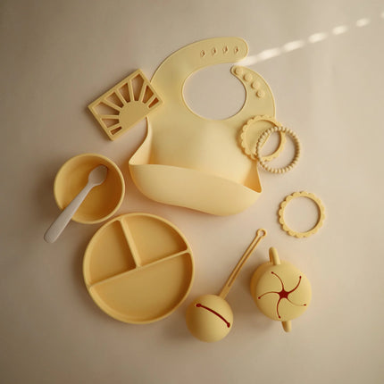 <tc>Mushie</tc> Assiette bébé en silicone pâle jonquille